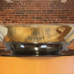 A polished metal bowl